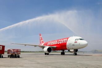 Carrying Photo AirAsia flight Z2 351 from Tagbilaran was welcomed by a water cannon salute upon arrival to its new home at the NAIA T2