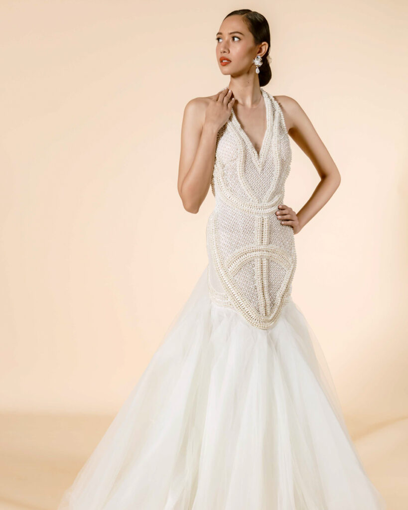 Hannah Kong Bridal Bridal gown with intricate pearl beadwork featuring an elegant mermaid skirt