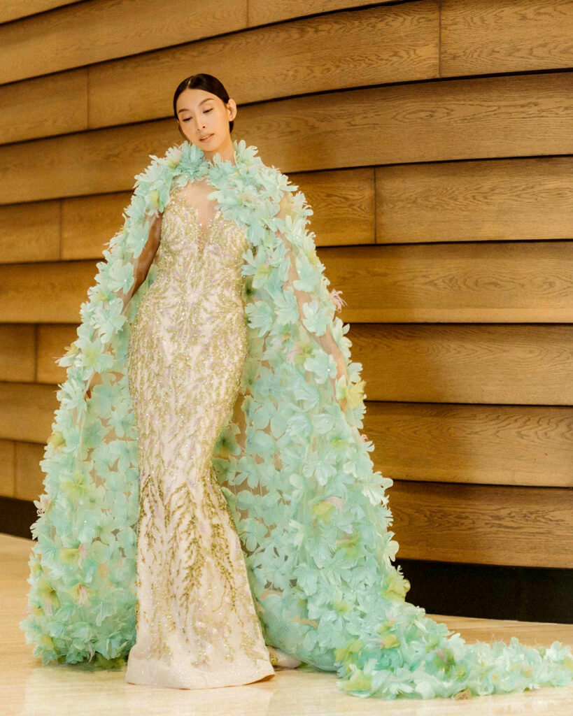 Hannah Kong Bridal Gold beaded gown with green floral cloak