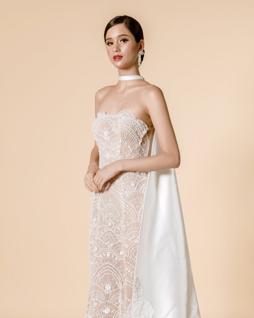 Hannah Kong Bridal Tube bridal gown with intricate beadwork and flowy veil