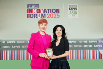 Khoon Fong Ang presents the Fortune's The Most Powerful Women 2025 honour to Dr. Malina Ngai, Group CEO of AS Watson, in recognition of her outstanding leadership and influence in the retail industry