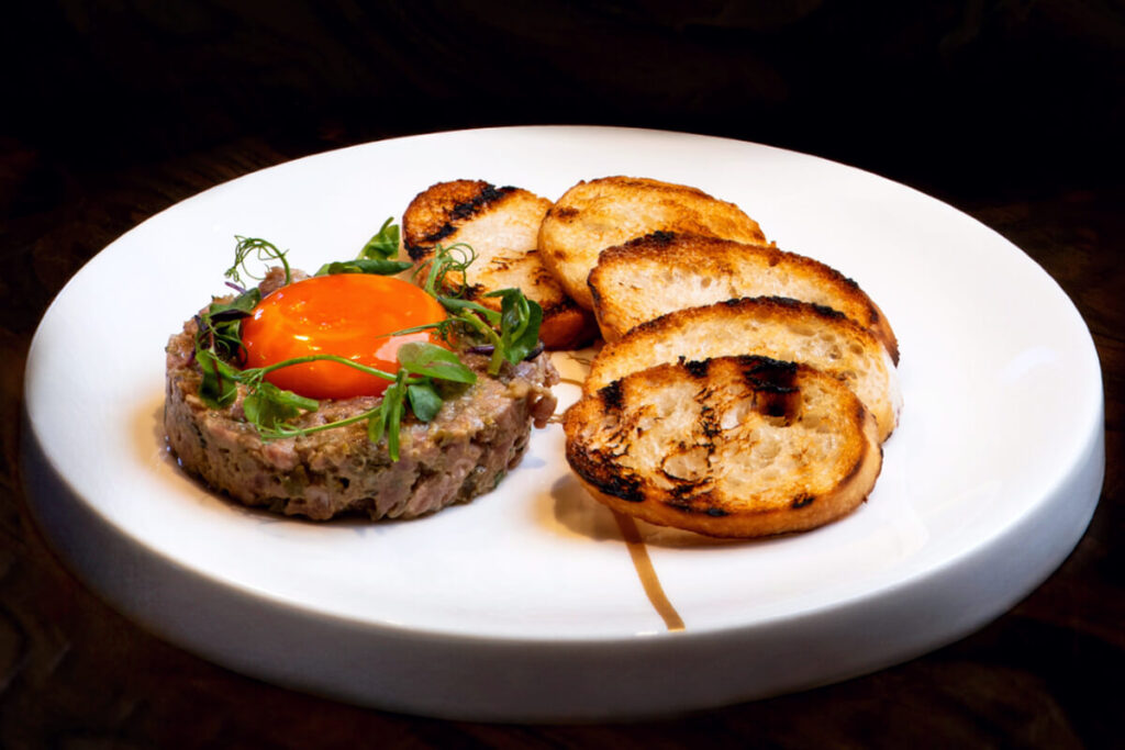 timeless classics made with modern flair at Quezon Club such as one of their appetizers, the Beef Tartare