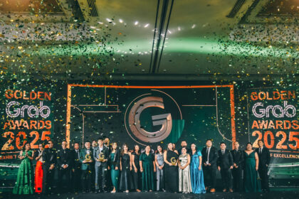 Golden Grab Merchants of the Year Juliet Chen (Serenitea), Gerby Estrella (JT’s Manukan Grille), and Ryan Tan (Oh Mango) with Grab Philippines leaders led by Managing Director Ronald Roda
